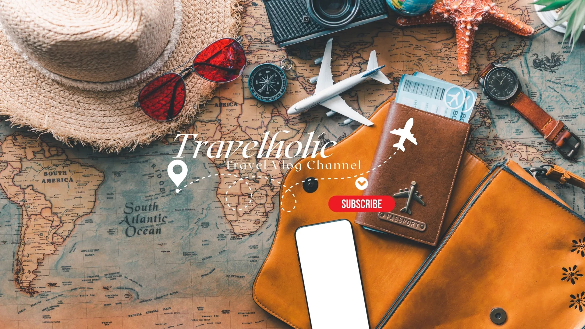 TravelHolics travel banner featuring a world map, passport, airplane, camera and travel accessories
